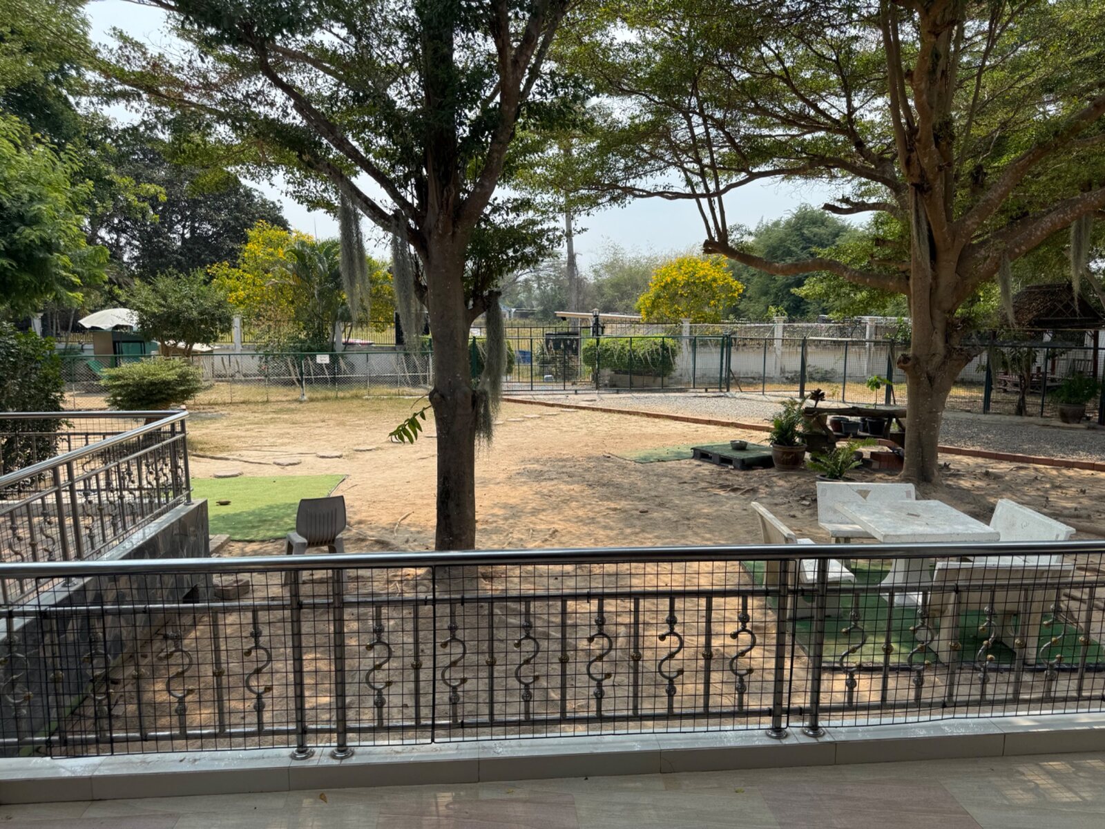 View across the spacious shaded grounds from the main building